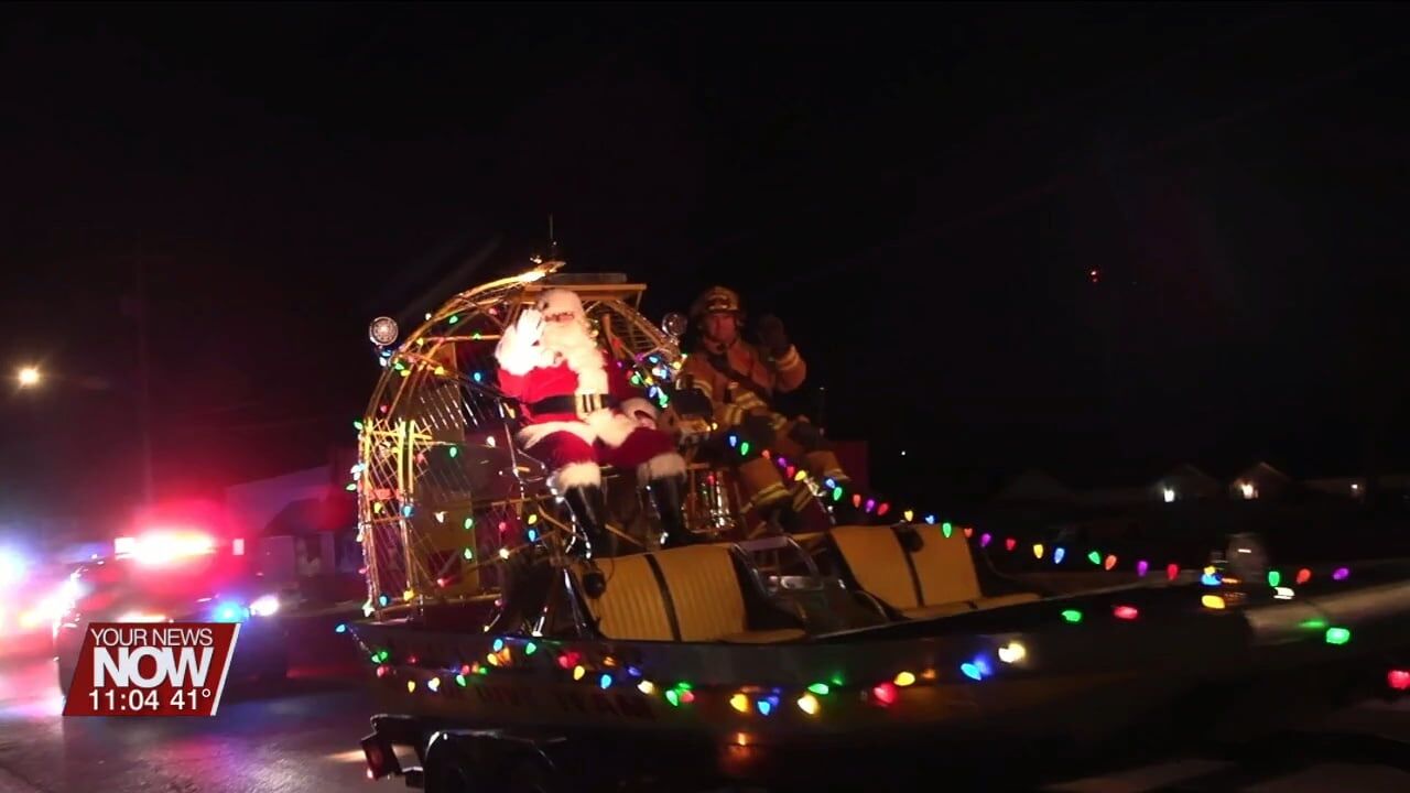 Kids of Russells Point see Santa ride through their neighborhoods